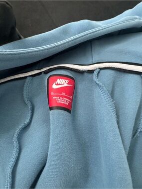 Nike Light Blue Hoodie with White Trim and Red Tag